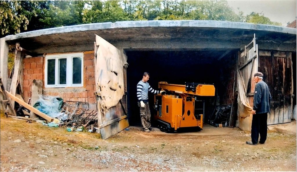 Our very first custom-built rig and the small garage where the VLIG journey officially began.